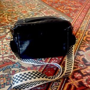 Clare V black midi sac with checkerboard crossbody strap